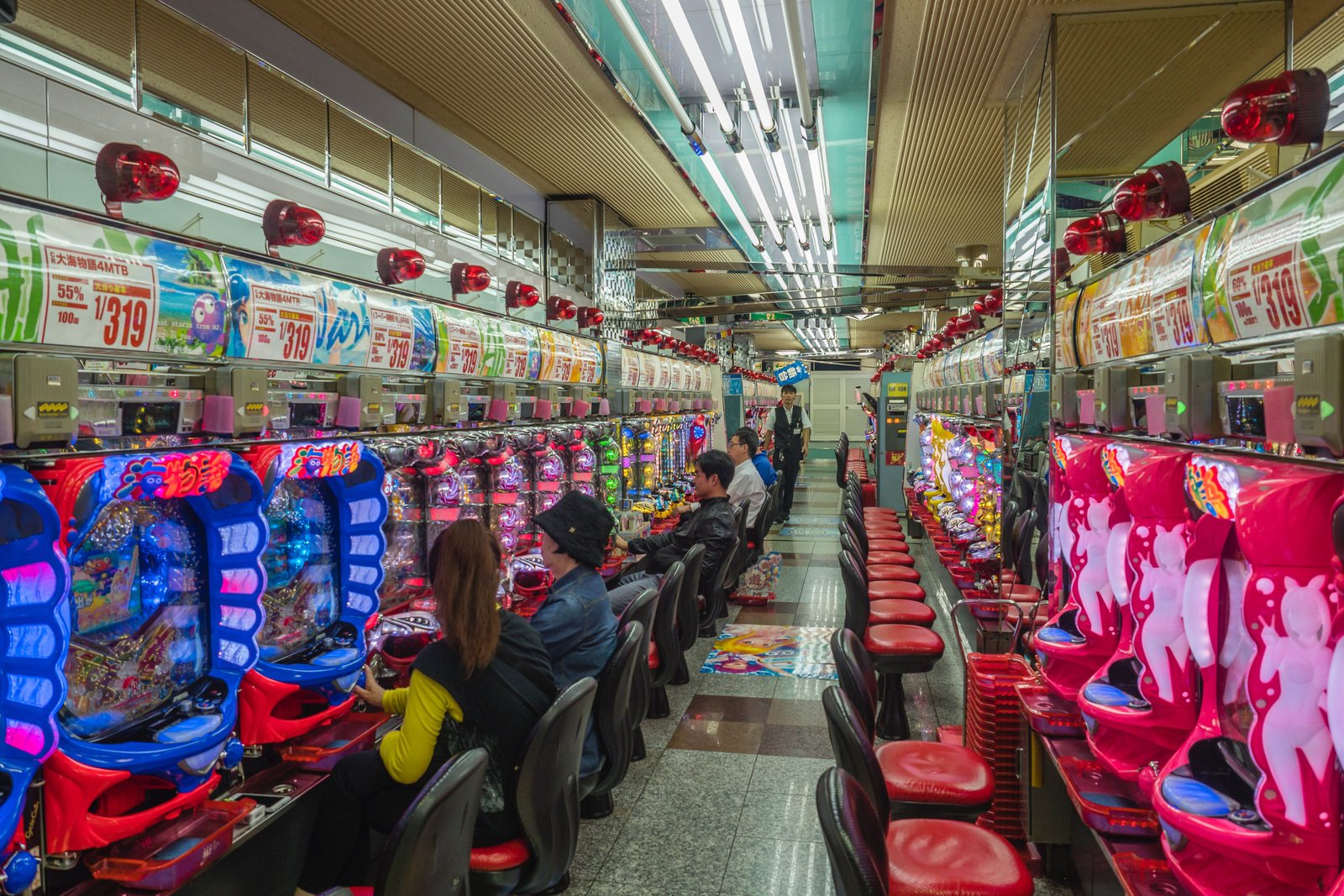 arcade with slot machines, neon lights