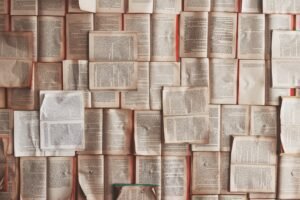 Lots of open books showing lots of text as an analogy for a large language model. maximising business with LLMs