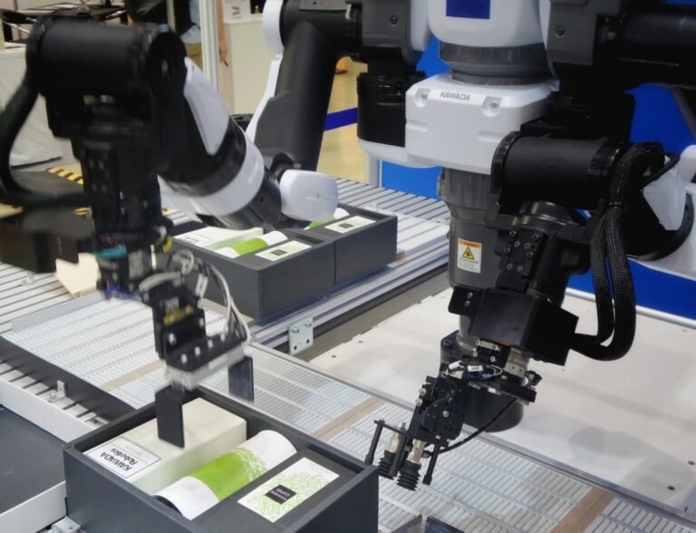 Robotic arms on a manufacturing line